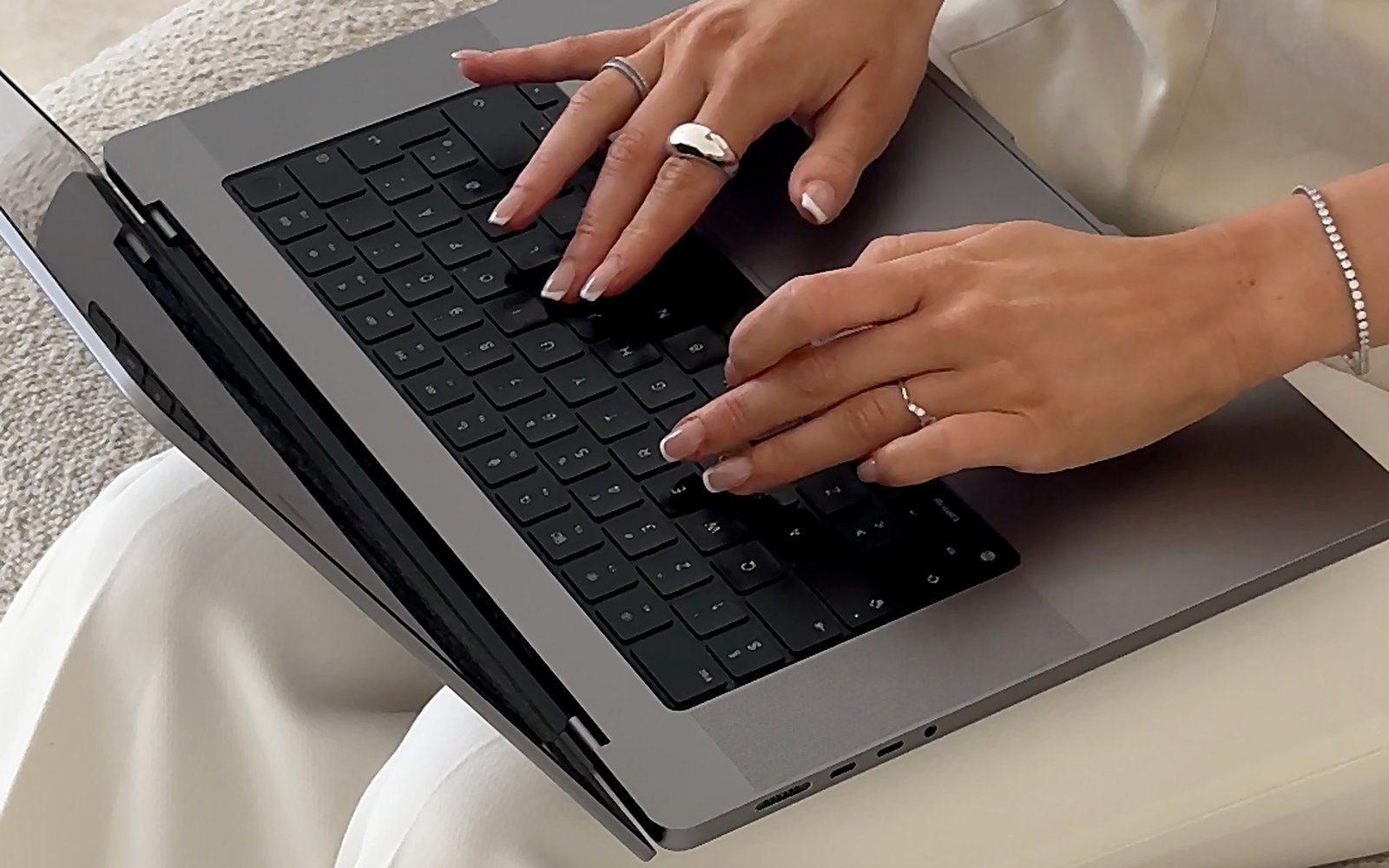 Person working on a website design on a laptop